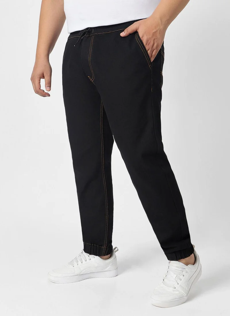 Urbano Fashion  Urbano Plus Men's Jet Black Regular Fit Washed Jogger Jeans Stretchable for Men | Best Price UAE